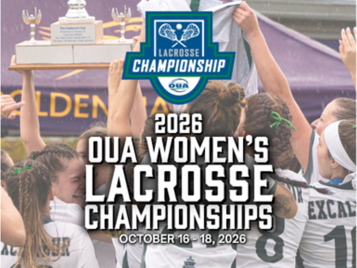 Women's lacrosse players hold a trophy above their heads