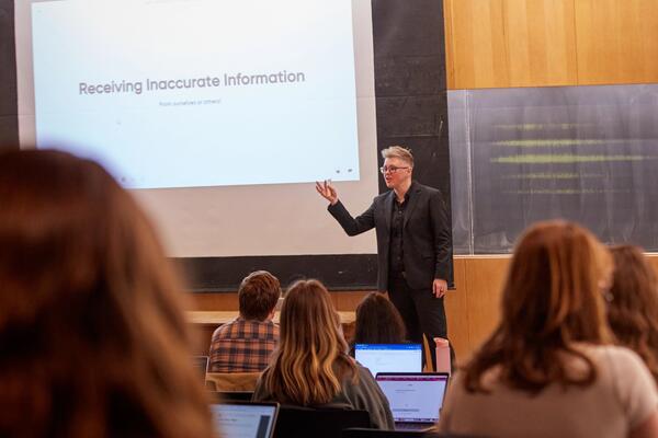 Lecture hall with professor teaching at the front