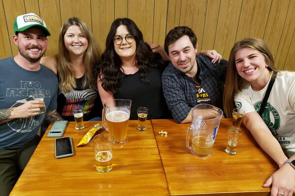 group of people at a bar