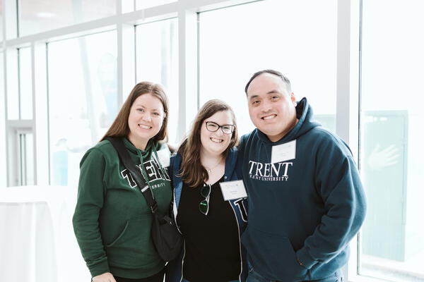 Group of three friends smiling
