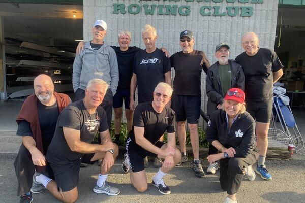 Jamie Fleming smiling next to friends