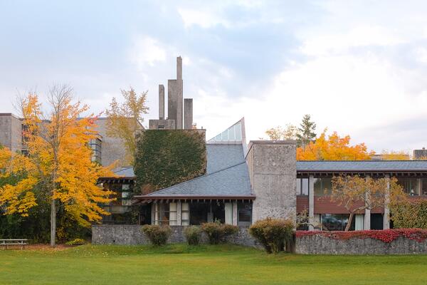 Alumni House from afar, Ron Thom architecture building in the Fall