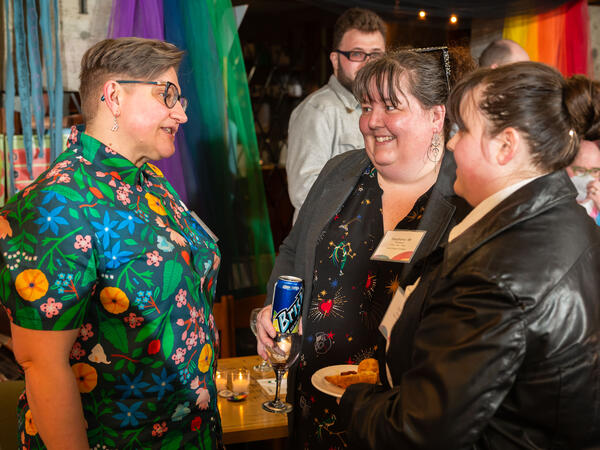 People talking at a social event.