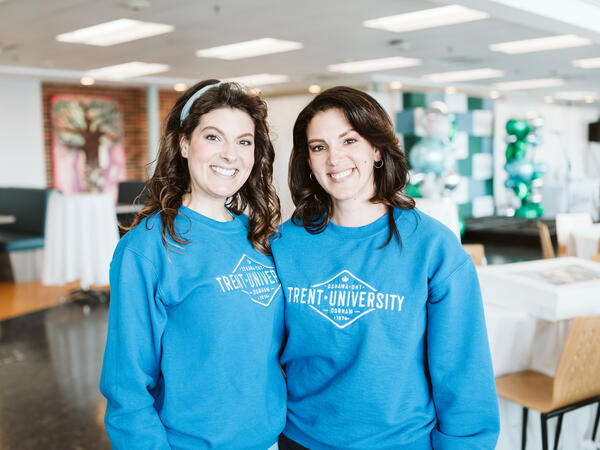 Maddie and Kiki Longo posing at the Trent Durham 50th anniversary alumni celebration.