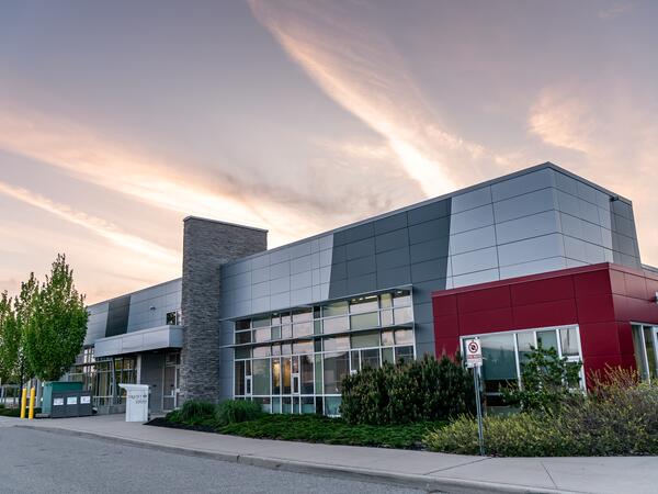 Exterior of Durham campus building at sunset