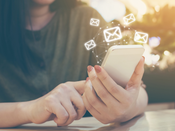 Person on their phone looking at email