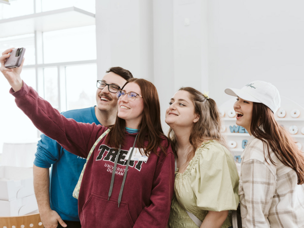 A group of four Trent Durham students taking a selfie