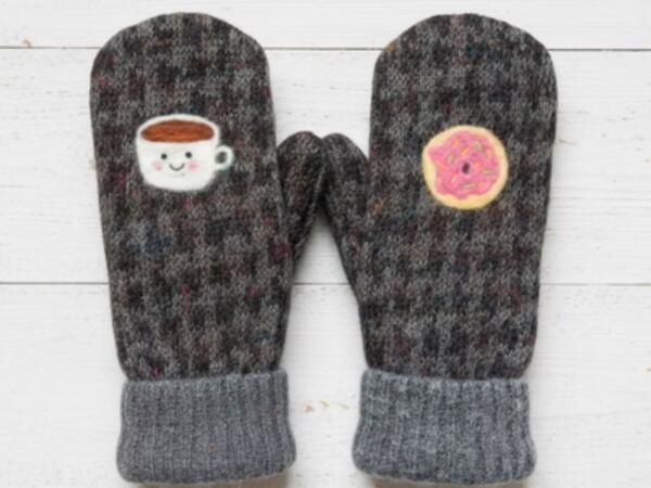 Mittens with a coffee stitched on one hand and a donut on the other