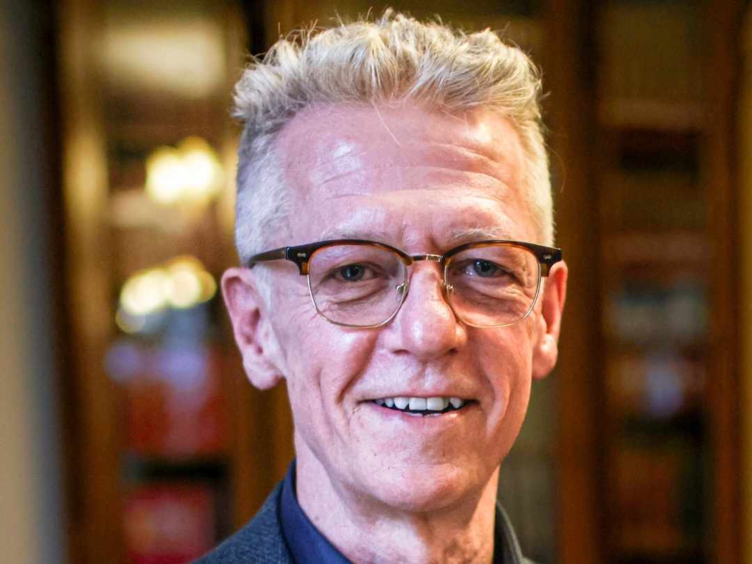Dr. James Orbinski smiling looking straight at camera