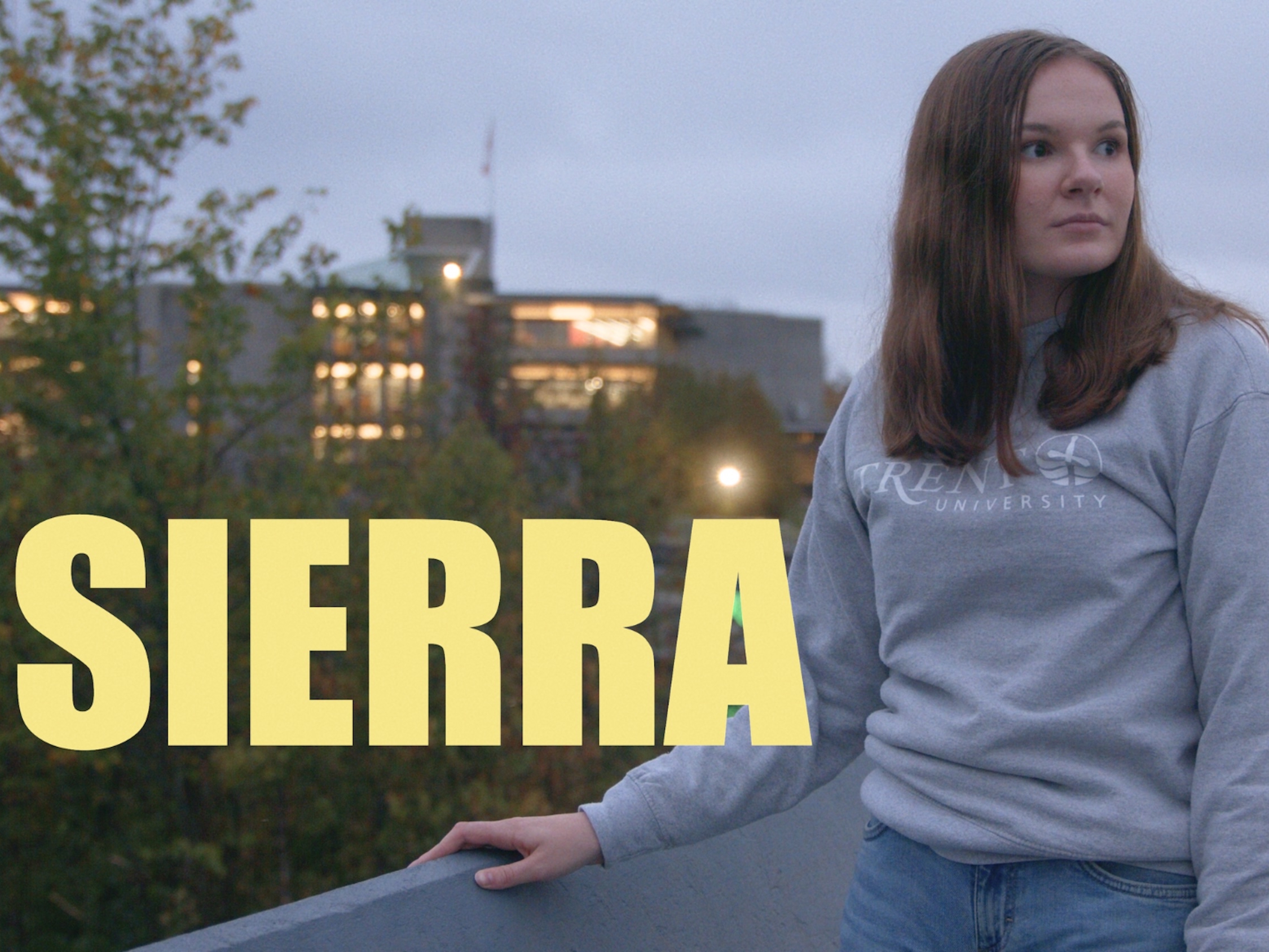 Trent Student Sierra Standing at Bridge 