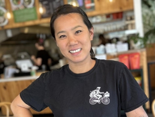 Susan Tung smiles in her restaurant