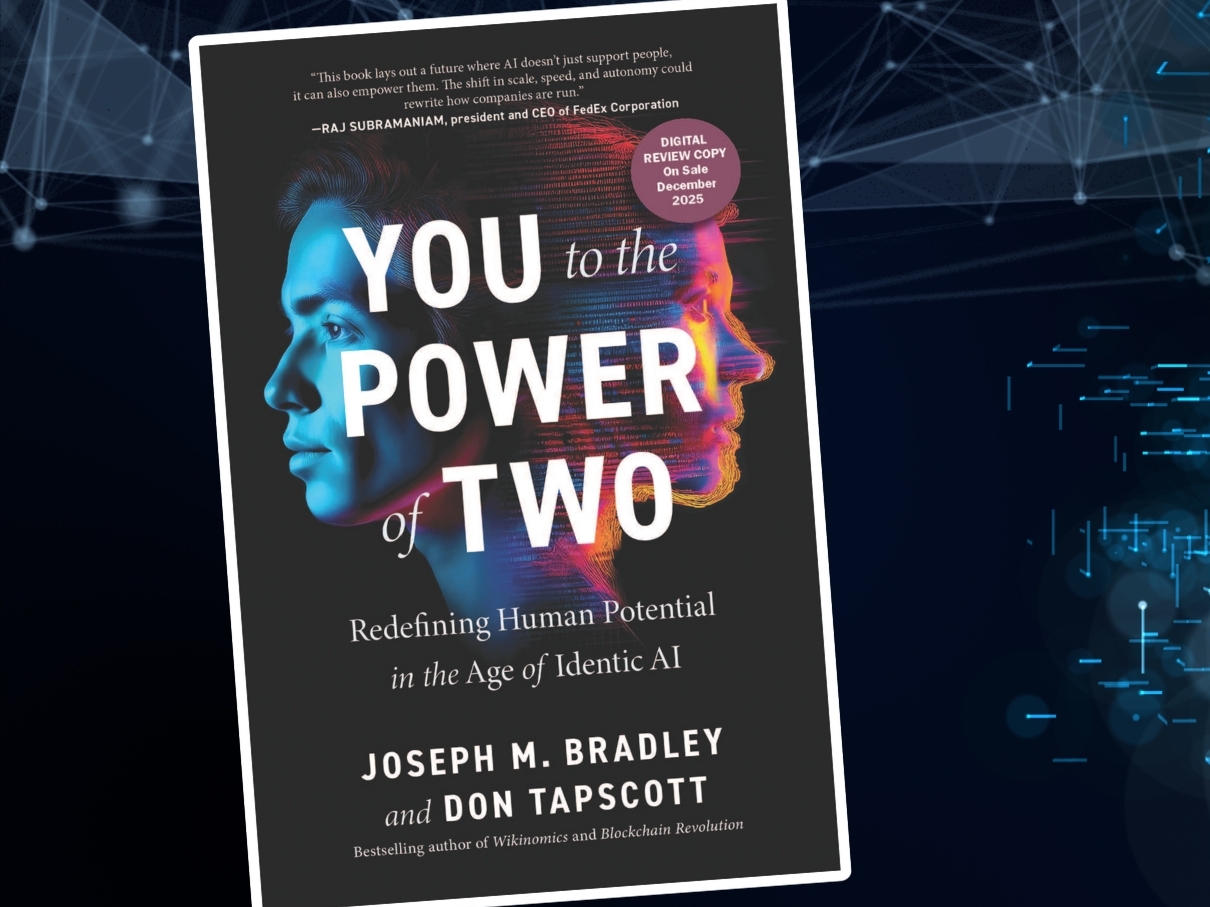 A book cover with two faces on it titled 'You to the Power of Two'