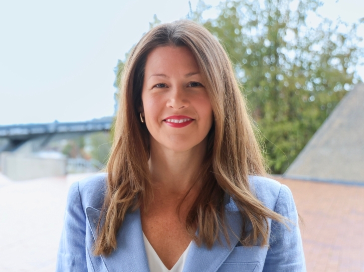 Sandy Marett standing outside of Trent Univeristy