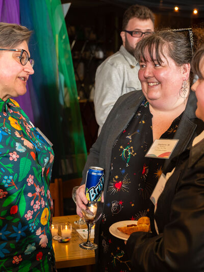 People talking at a social event.