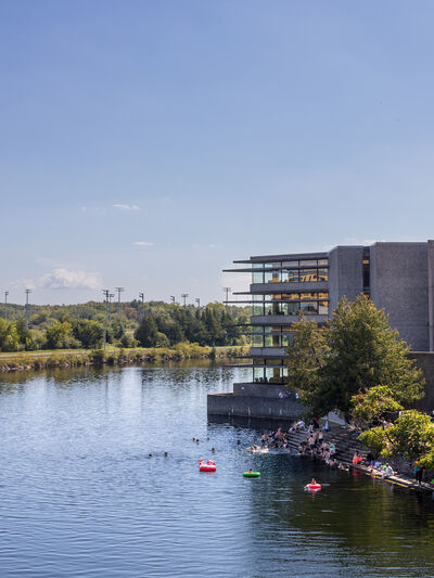 Bata library in the summer with people swimming