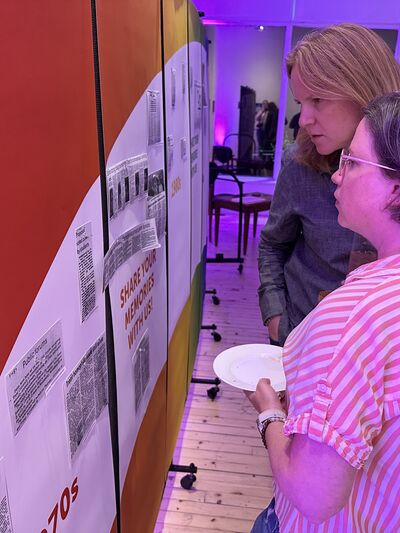 People looking at archive display