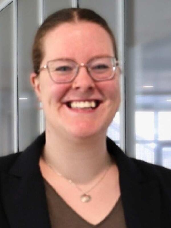 Rachel Smylie smiling in a Trent hallway