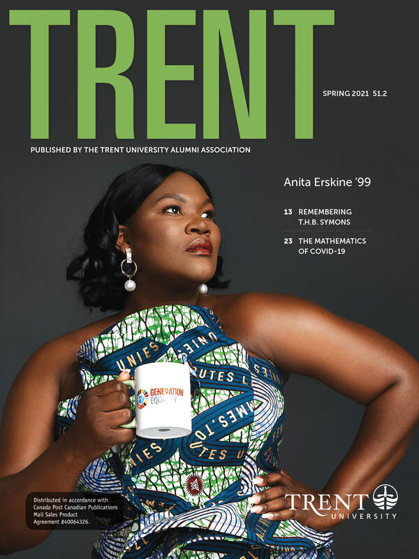 Anita Erskine holding a coffee mug and looking right