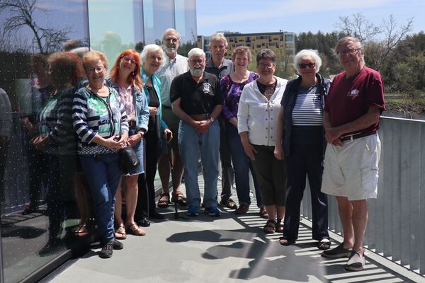 Group of retirees standing outside